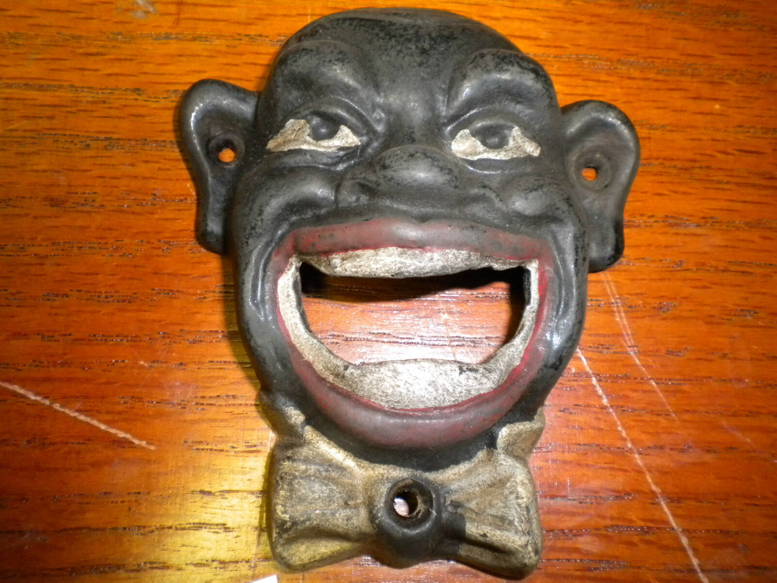 Black Face cast iron bottle opener or paper weight new antique finish wall mount