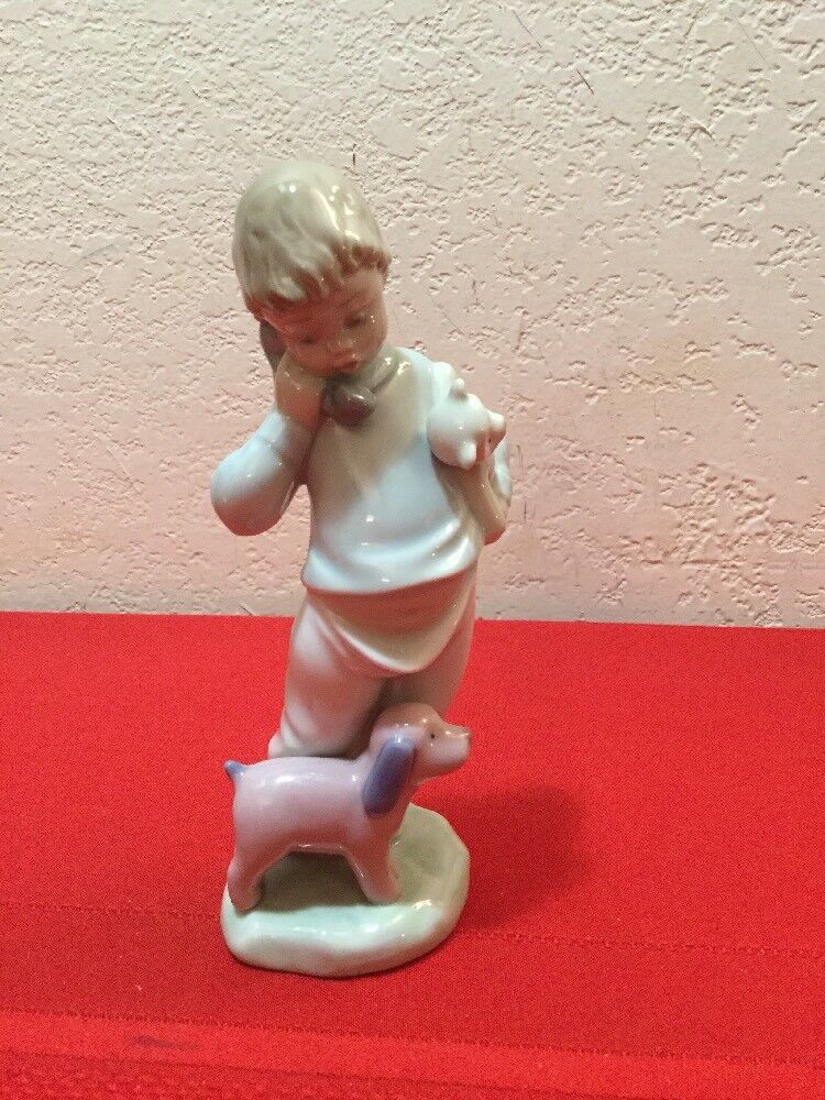 Boy on The Phone With Puppets - NAO Figurine by Lladro #1044