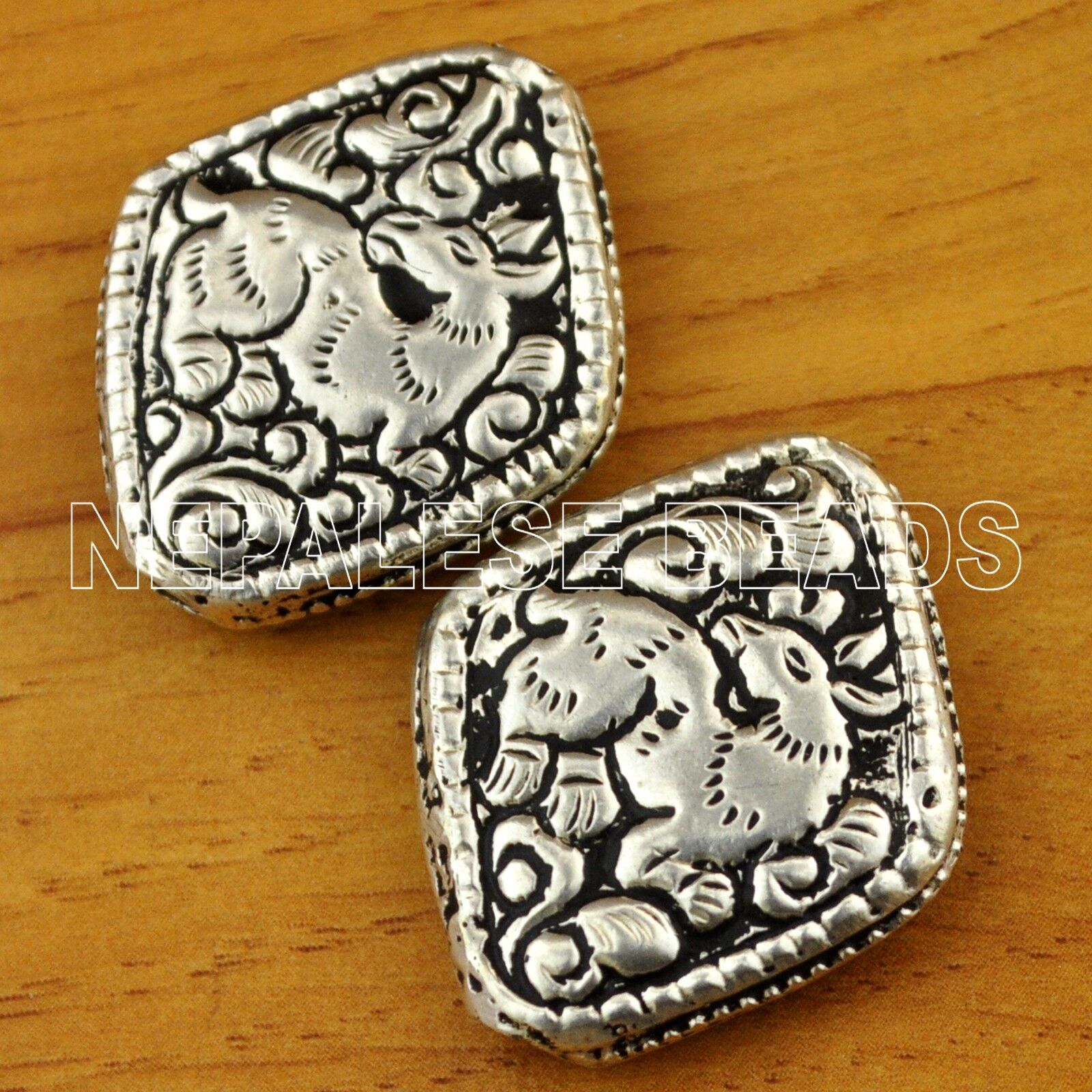 BD1462 Nepali Artisan Handmade Deer Repousse Plain Silver Plated 2 beads Nepal 