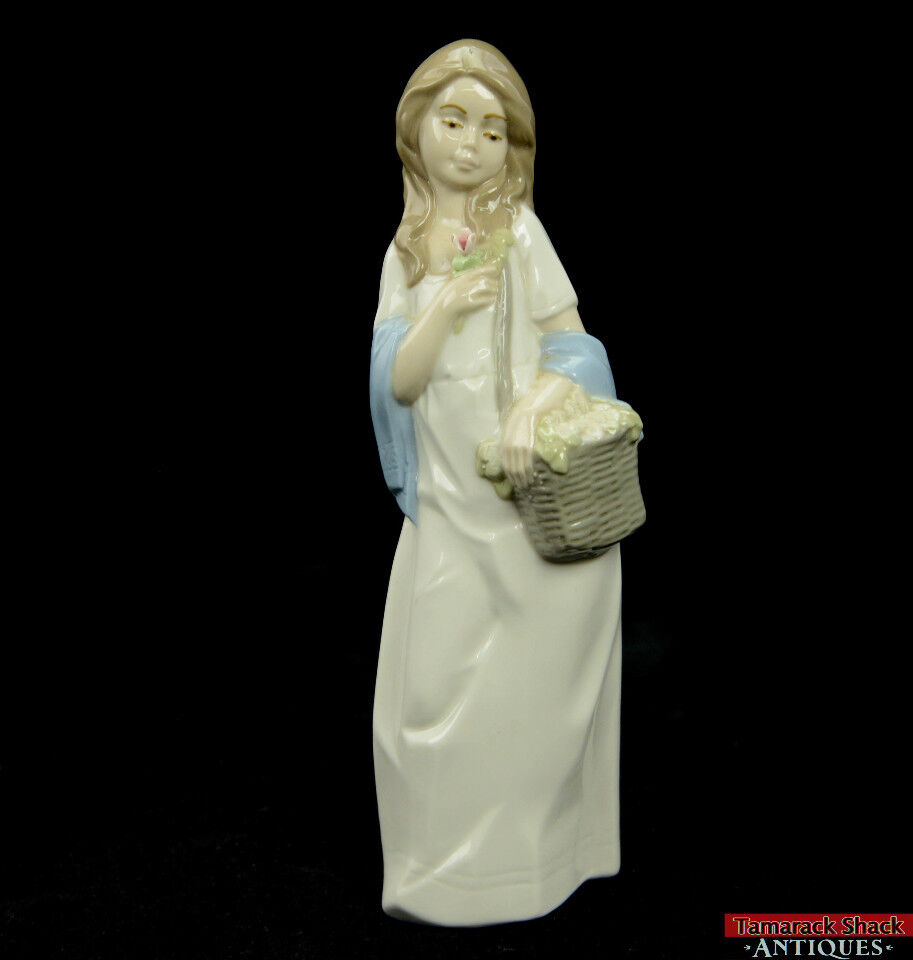 Nadal Handcrafted Porcelain Girl w/Flower Basket Figurine 9 1/2\