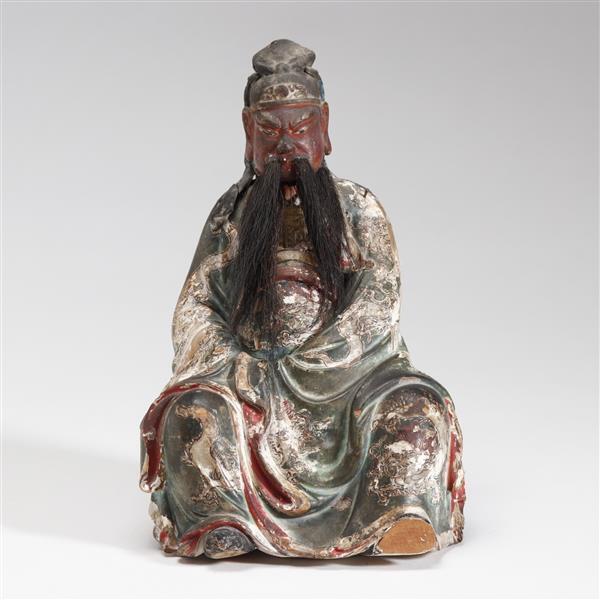 Chinese carved wood seated deity figure of Guan Yu with horse hair, l... Lot 428