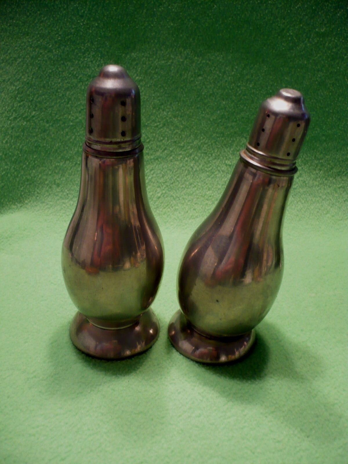 Set of (2) vintage REVERE heavy PEWTER shakers with glass inserts.Unusual tilted
