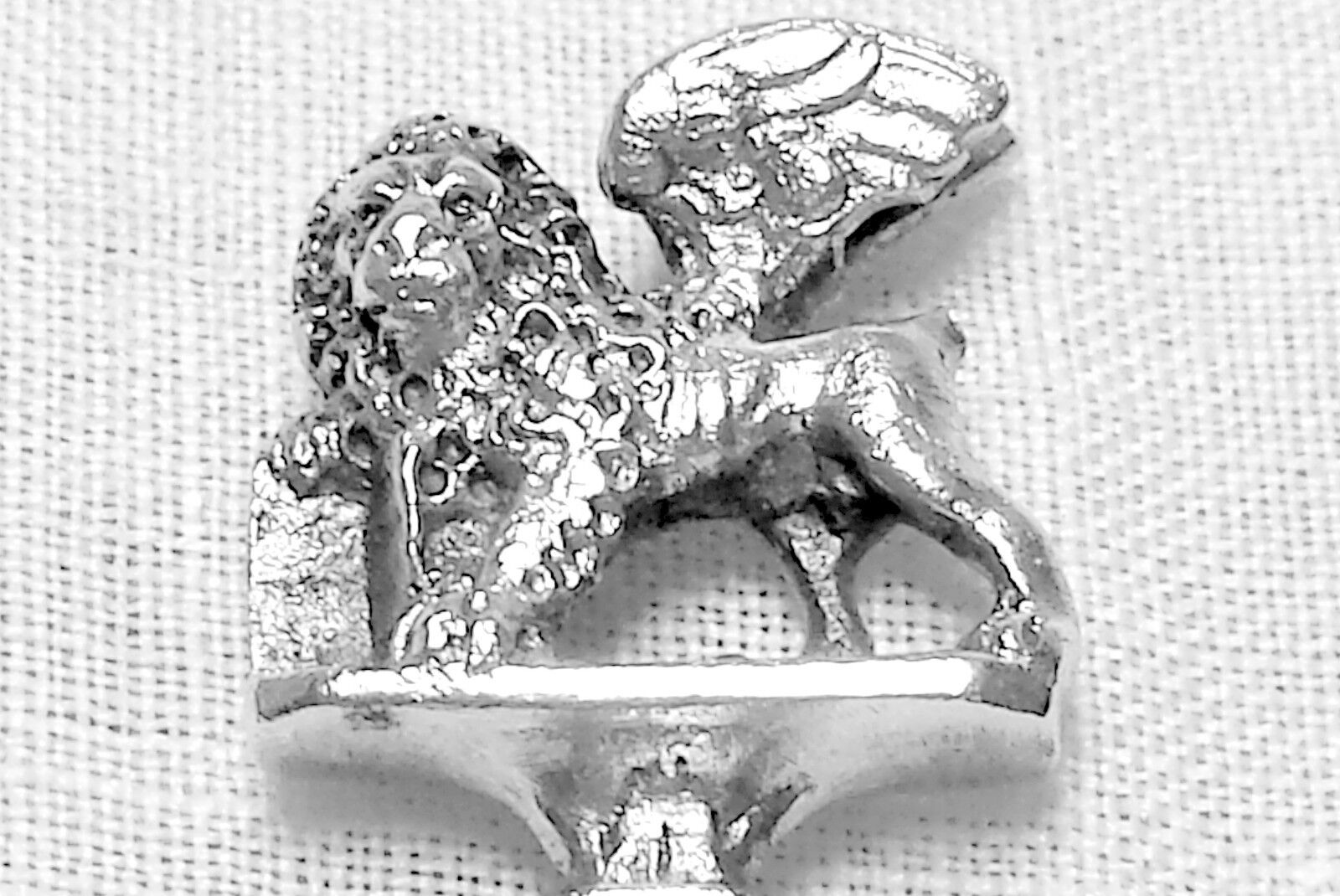 Italian figural demitasse spoon with cast winged lion finial in 800 silver