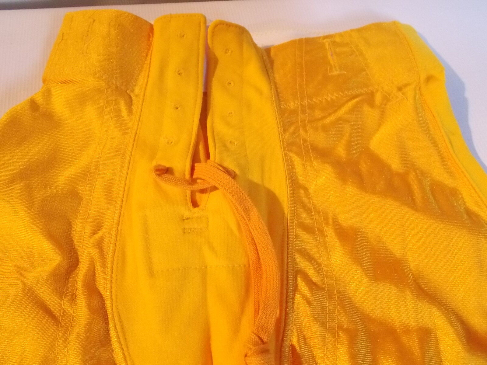  NEW YELLOW YOUTH FOOTBALL PANTS,,SMALL,MADE IN  U.S.A,VINTAGE 80\'S