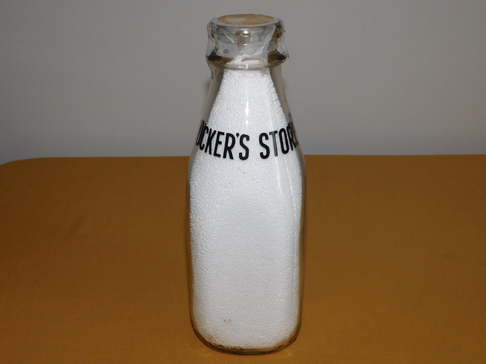 VINTAGE OLD 1956 TUCKER'S STORE  1 ONE QUART MILK BOTTLE
