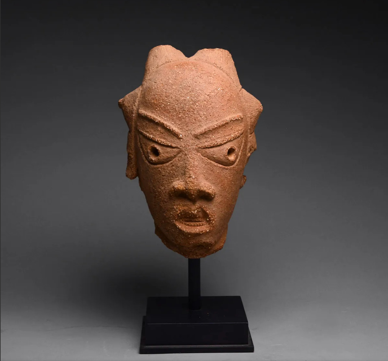 Large Ancient Nok Terracotta Head of a Woman (900 BC–200AD) Large Ancient Nok Terracotta Head of a Woman (900 BC–200AD)