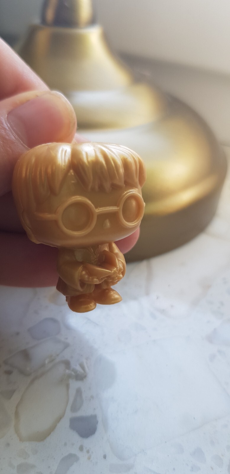 złota figurka Harry Potter złota figurka Harry Potter