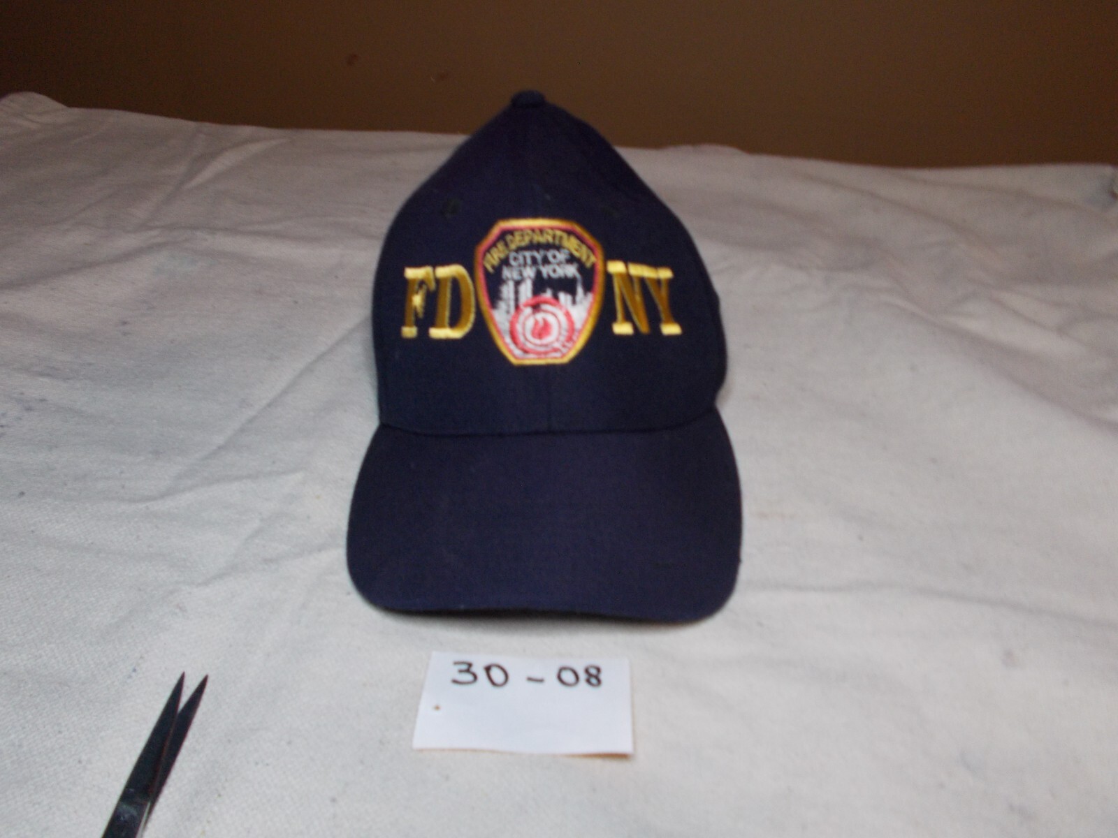 Cap with New York City fire Dept. logo. this item is no longer avalable Cap with New York City fire Dept. logo. this item is no longer avalable