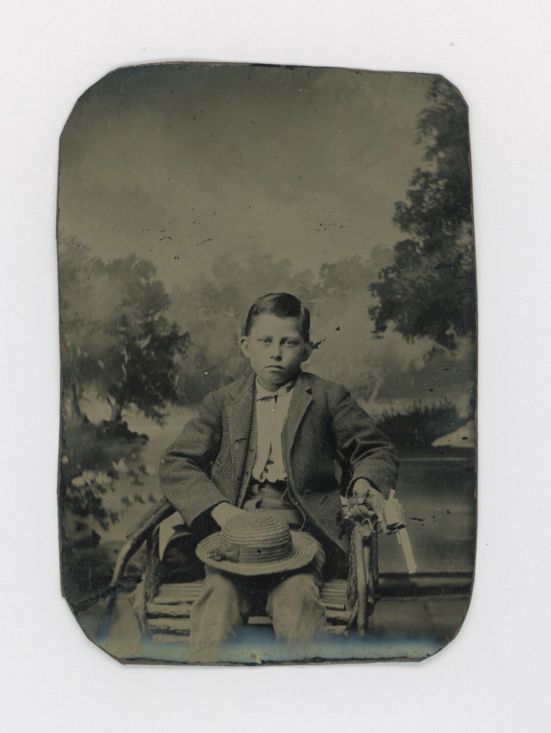Ca. 1870's-1880's TINTYPE SERIOUS LOOKING BOY HOLDING A REAL SIX GUN PISTOL Ca. 1870's-1880's TINTYPE SERIOUS LOOKING BOY HOLDING A REAL SIX GUN PISTOL