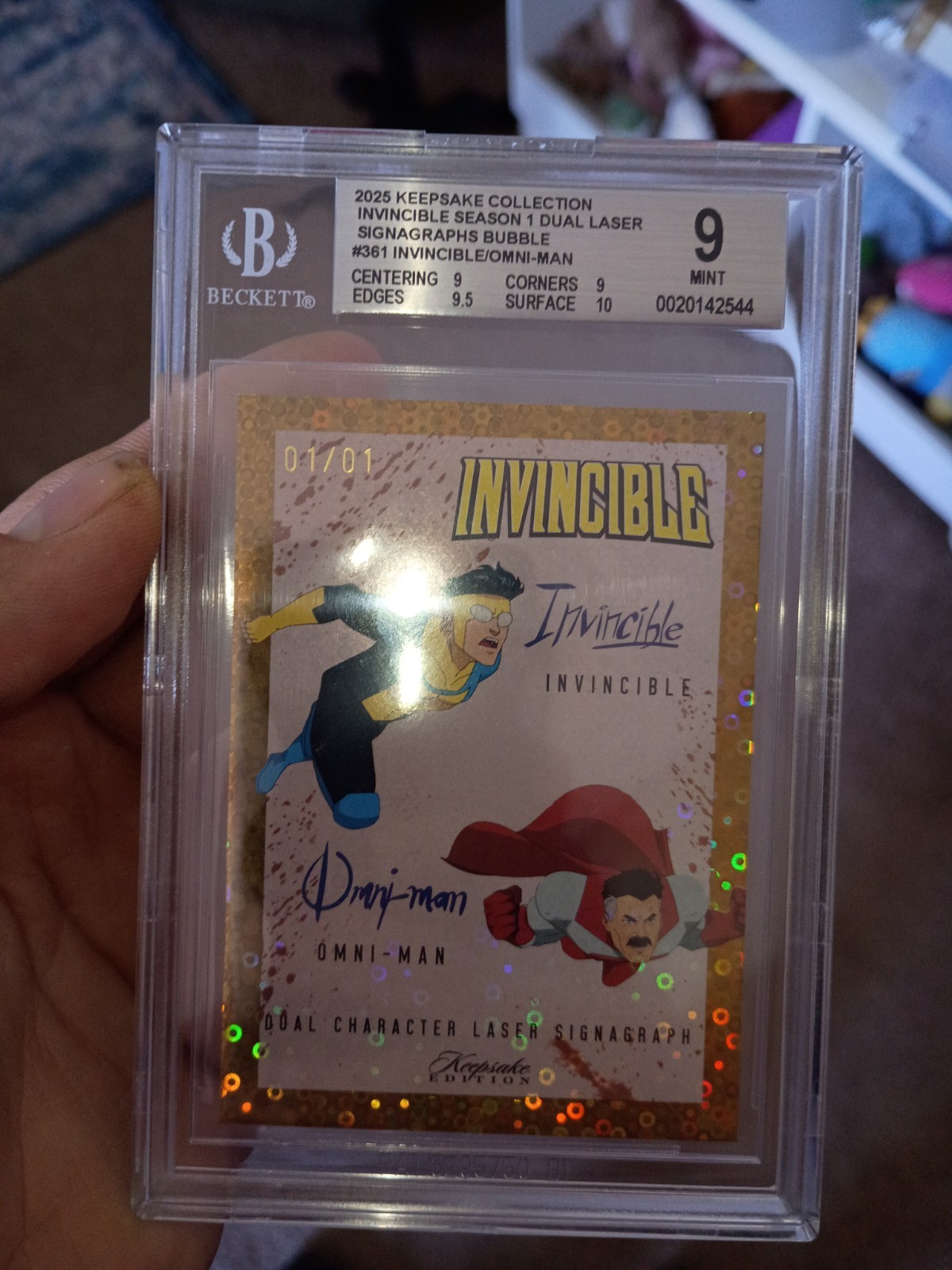 (Only In Existence) 1/1 Invincible and Omni-Man Dual Signature Gold Bubble Foil