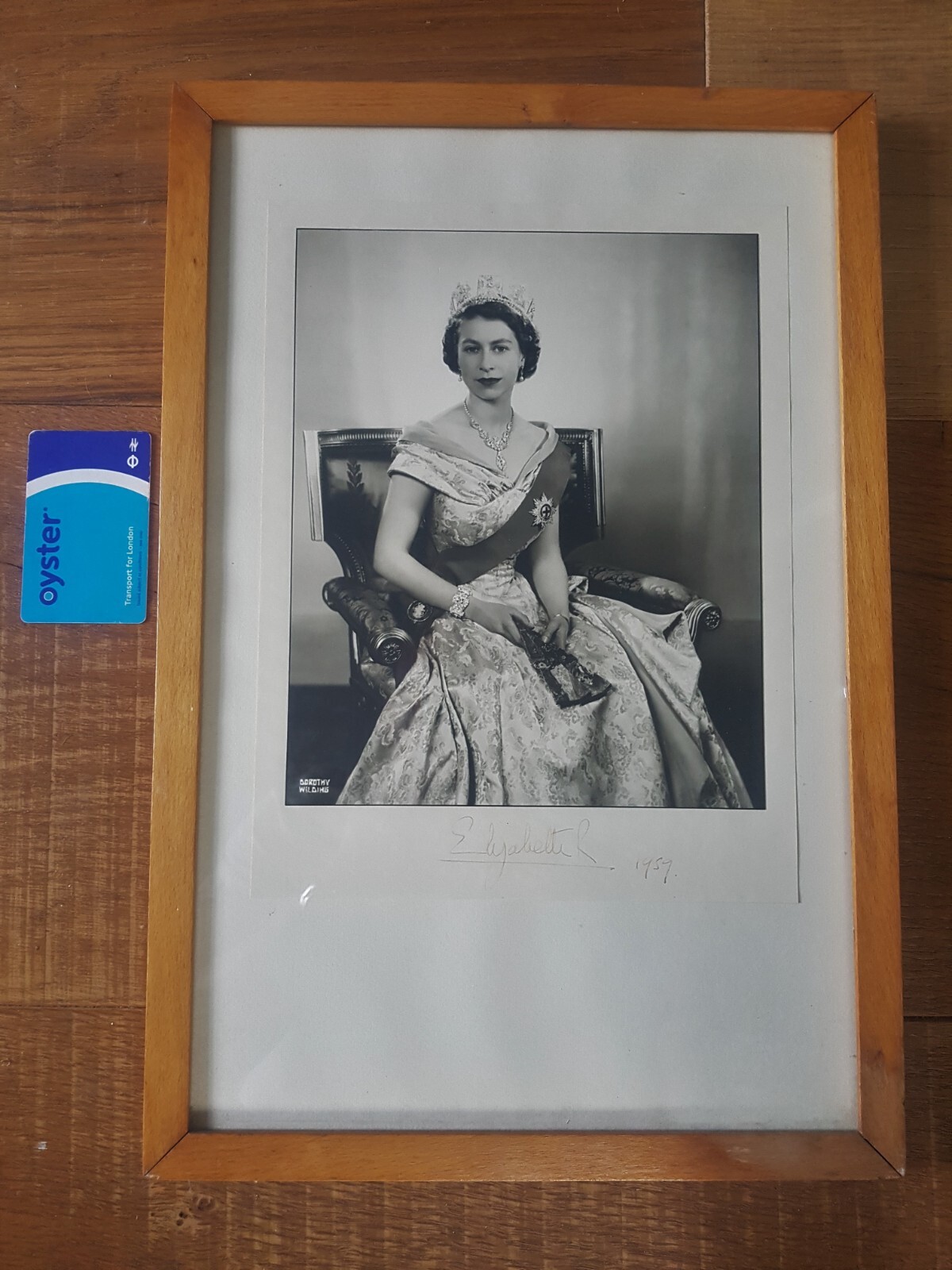 Official photograph of H.M. Queen Elizabeth II - 1952 - signed by H.M. in 1959 Official photograph of H.M. Queen Elizabeth II - 1952 - signed by H.M. in 1959