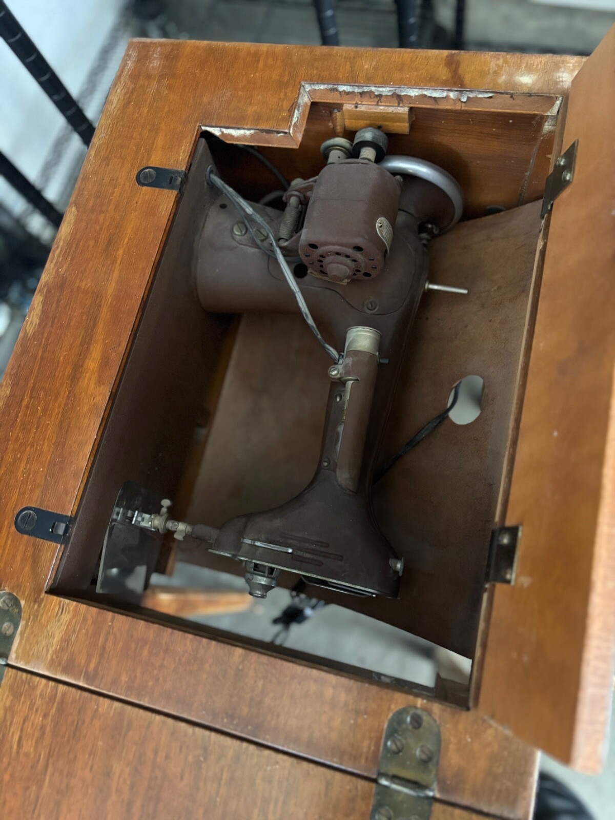 Antique Sewing Machine in original cabinet. My Grandmother's sturdy machine. Antique Sewing Machine in original cabinet. My Grandmother's sturdy machine.