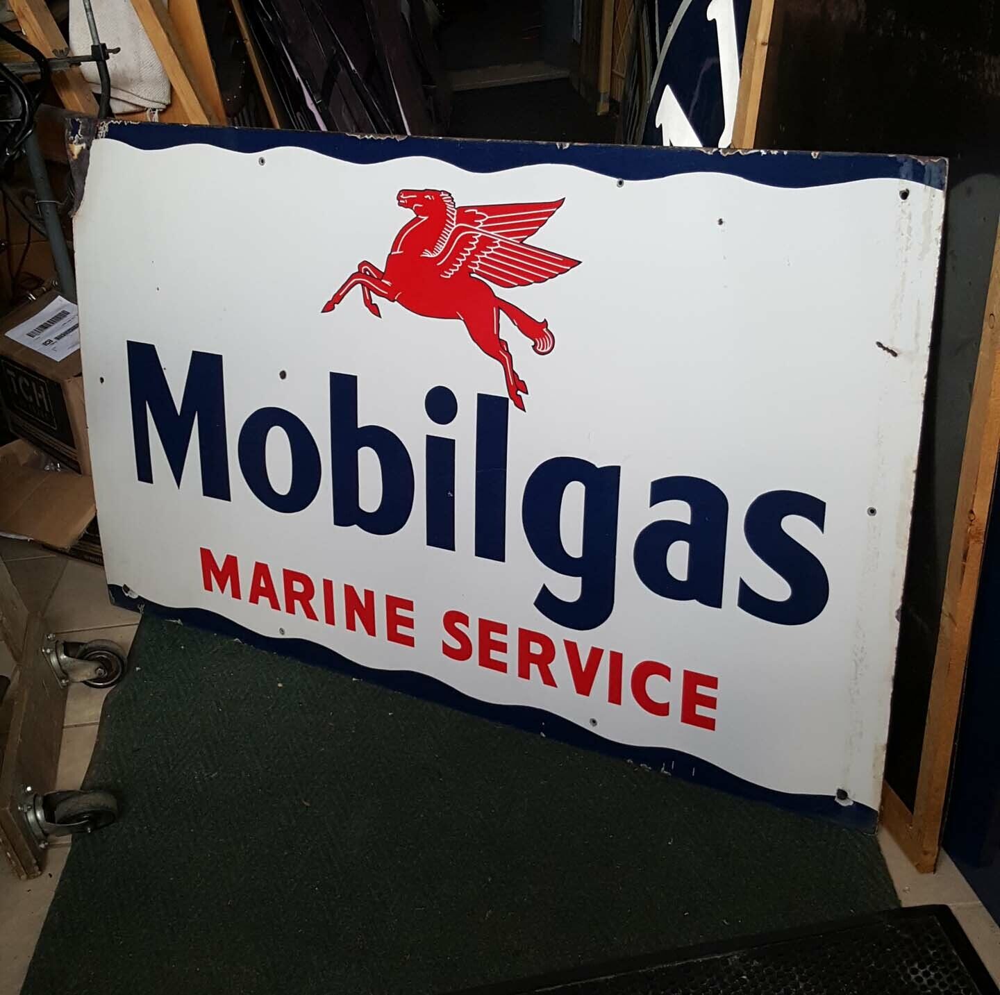 Mobil Gas porcelain sign, c other neon signs, clocks, Marine Chevrolet, Cadillac