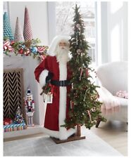 Life Size 57” Santa Claus next to 72” Lighted Candied Christmas Tree picture