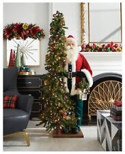 57” Life Size Jingle All The Way Santa Claus Next To 72” Lighted Christmas Tree picture