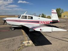Single Engine Airplanes: Mooney M20C four person aircraft picture