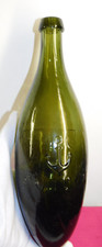 ANTIQUE KOUMYS PICTORIAL TORPEDO BOTTLE