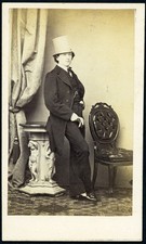 handsome young man in top hat, strange hand, gay int., Vienna by GUAI, antique C picture