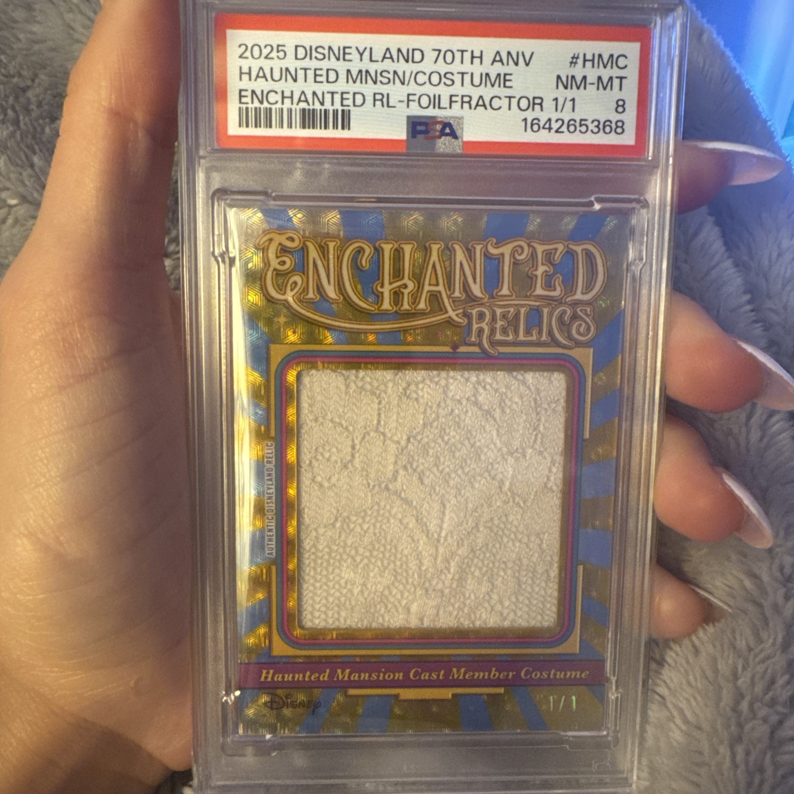 2026 Topps Disneyland 70th Enchanted Relics 1/1 Haunted Mansion Shirt PSA 8 2026 Topps Disneyland 70th Enchanted Relics 1/1 Haunted Mansion Shirt PSA 8